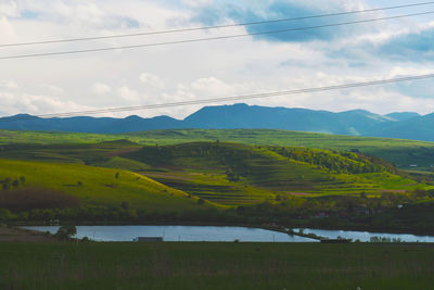 Scenic view of field against sky