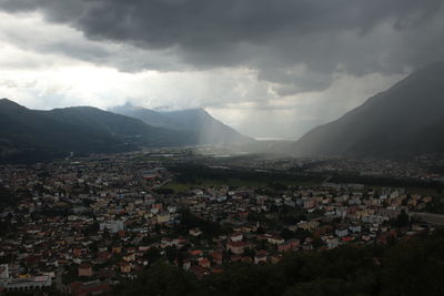 Aerial view of townscape against sky