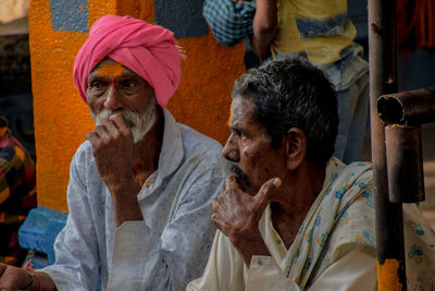 Portrait of friends looking at camera