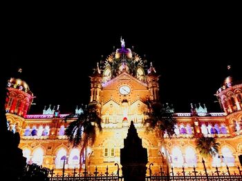 Low angle view of illuminated statue at night