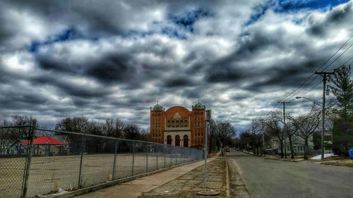 View of road against cloudy sky