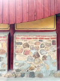 Built structure against brick wall