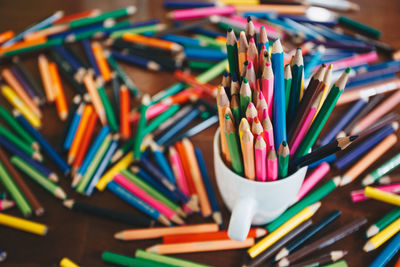 Close-up of colored pencils on table