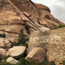 Stone wall against sky