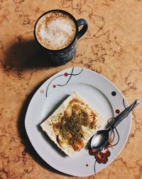High angle view of breakfast served on table