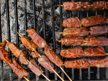 Close-up of meat on barbecue grill