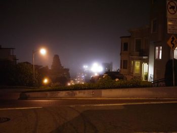 Illuminated street light at night