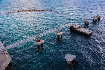 High angle view of incomplete pier over sea