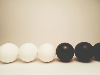 Close-up of candies against white background