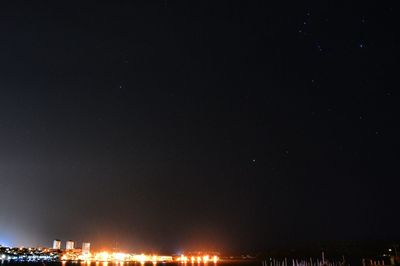 Illuminated cityscape at night