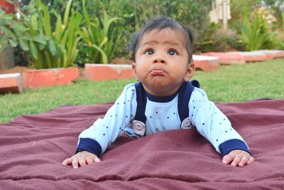 Portrait of cute boy looking away