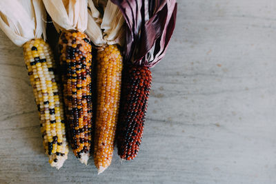 Close-up of various corns on the table