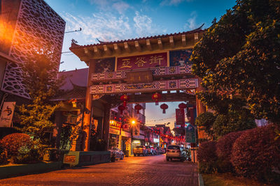 Illuminated buildings in city at night