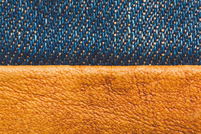 Close-up item leather pockets on jeans, flag of ukraine