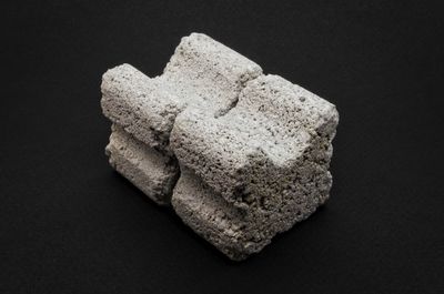 High angle view of ice cream over black background