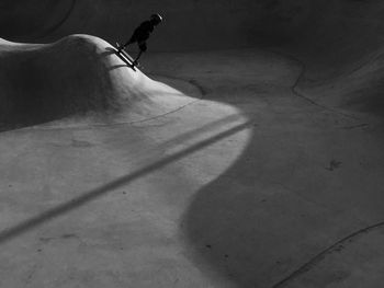 Person skateboarding at skateboard park