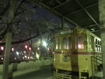 View of illuminated street at night