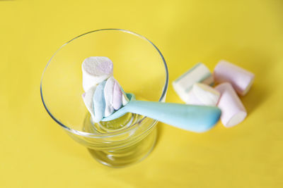 High angle view of drinking glass on table