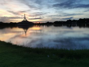 Reflection of clouds in lake during sunset