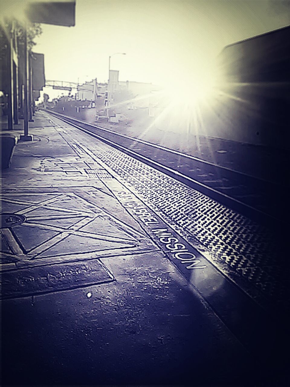 sunlight, sun, sunbeam, built structure, sunny, lens flare, architecture, transportation, shadow, the way forward, building exterior, day, no people, sky, clear sky, bright, empty, diminishing perspective, outdoors, vanishing point