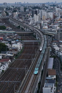 Bullet trains in tokyo through the city
