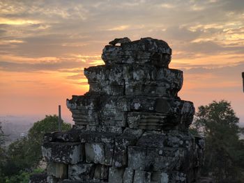 Old ruins against sky during sunset