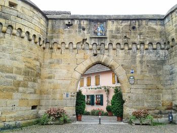 Exterior of historic building against sky