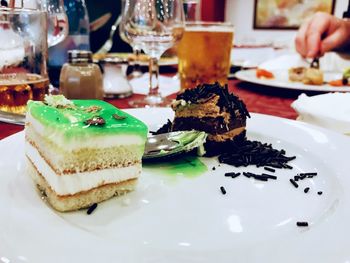 Close-up of cake served on table in restaurant