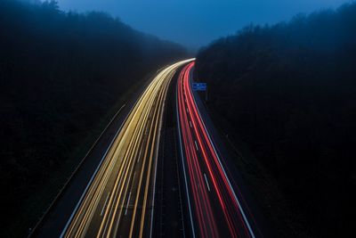 High angle view of light trails on highway