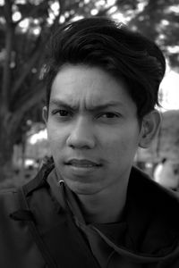 Close-up portrait of young man outdoors