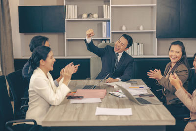 Business colleagues working at office