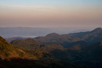 Scenic view of mountains against sky during sunset