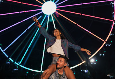 Low angle view of young woman standing on stage