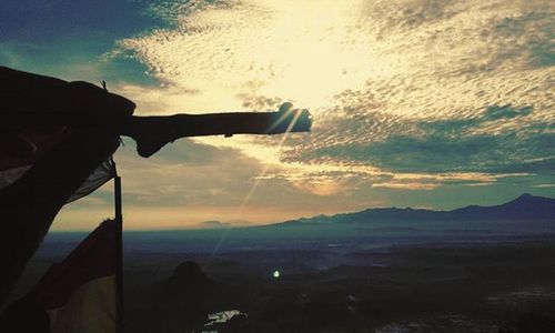 Scenic view of mountains at sunset