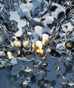 Sky seen through holes in ice