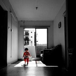 Boy standing at home