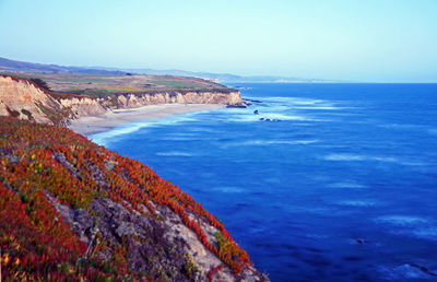 High angle view of calm sea against clear sky