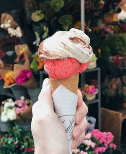 Midsection of person holding ice cream