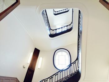 Low angle view of spiral staircase in building