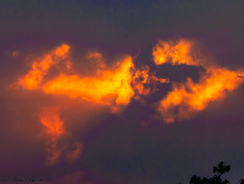 Low angle view of clouds in sky during sunset