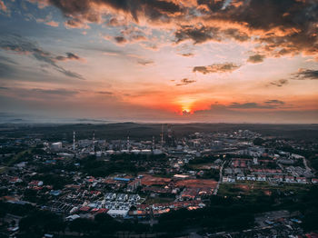 High angle view of townscape against sky at sunset