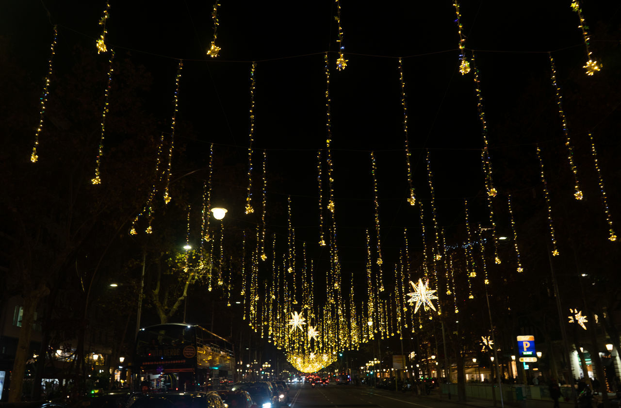 night, illuminated, light, lighting, transportation, car, lighting equipment, mode of transportation, motor vehicle, christmas lights, darkness, city, architecture, decoration, no people, celebration, street, evening, street light, motion, nature, outdoors, glowing, built structure, sky, road