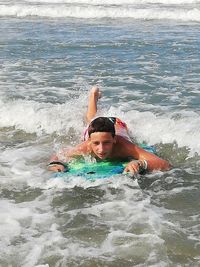 Man swimming in sea