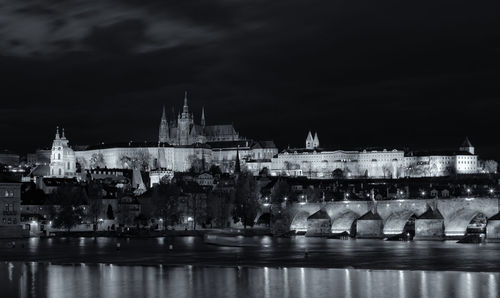 Illuminated buildings in city at night