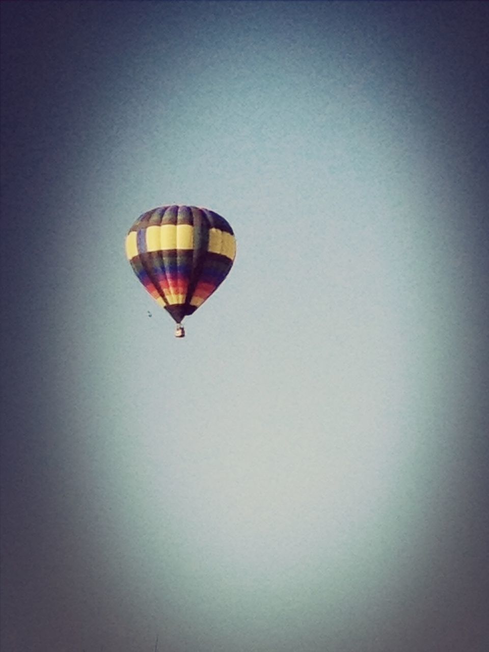 low angle view, flying, clear sky, copy space, mid-air, lighting equipment, hot air balloon, illuminated, sky, multi colored, hanging, street light, electric light, blue, no people, outdoors, night, lantern, parachute