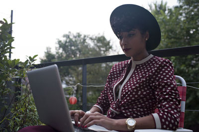 Young woman working on a laptop