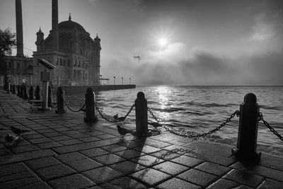 View of mosque in sea and fog