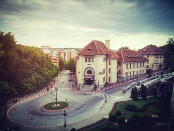 View of road against cloudy sky