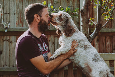 Portrait of man with dog