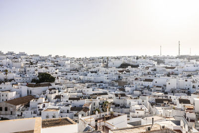 High angle view of buildings against clear sky
